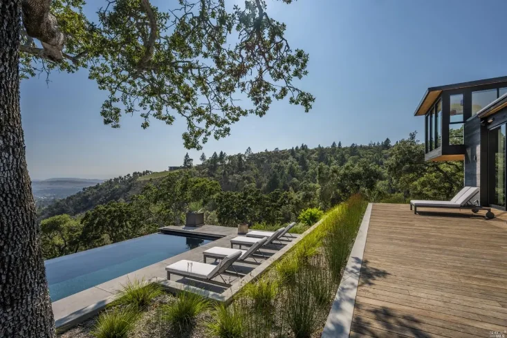 Finished infinity pool overlooking a hillside