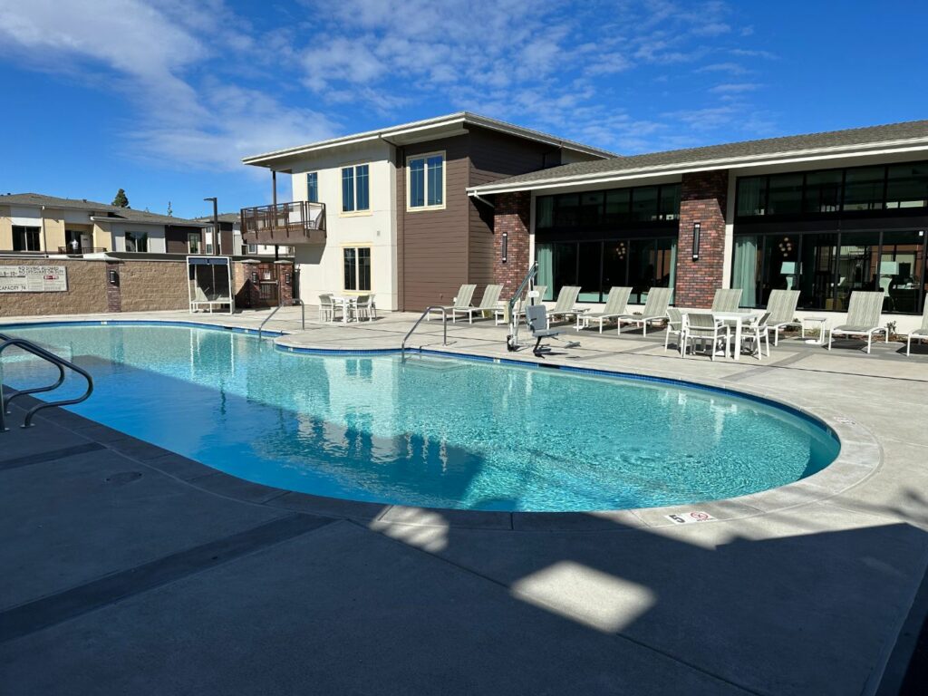 Large oval custom shaped commercial pool approx. 1,600 square feet for apartment complex in Rocklin, California.