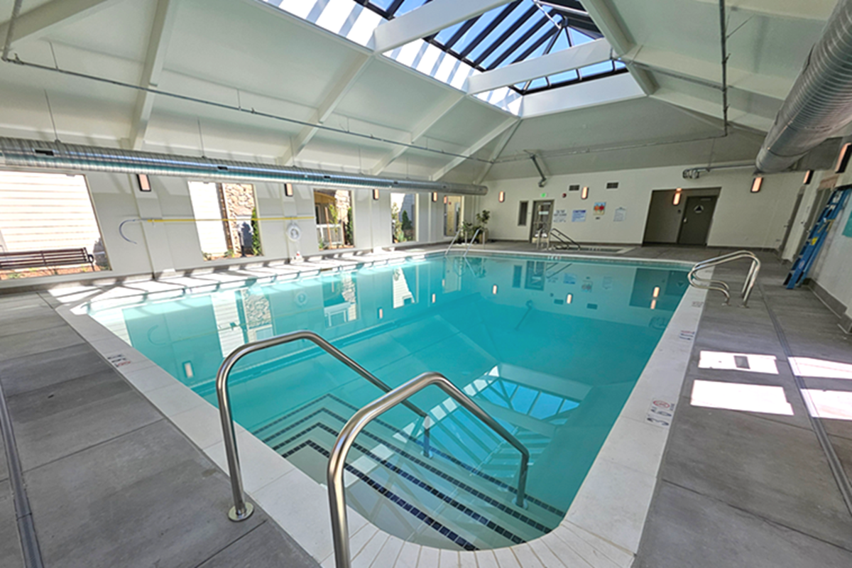 Large indoor 1,200 square foot pool plus spa for senior living apartments in Auburn, Califoria