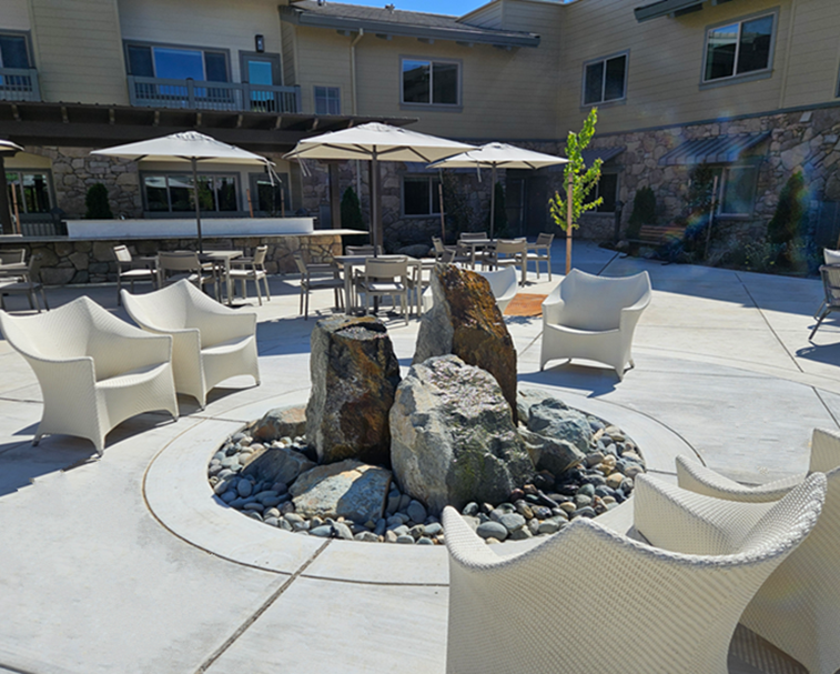 Three boulder rock cluster fountain custom built for senior living apartments in Auburn, Califoria